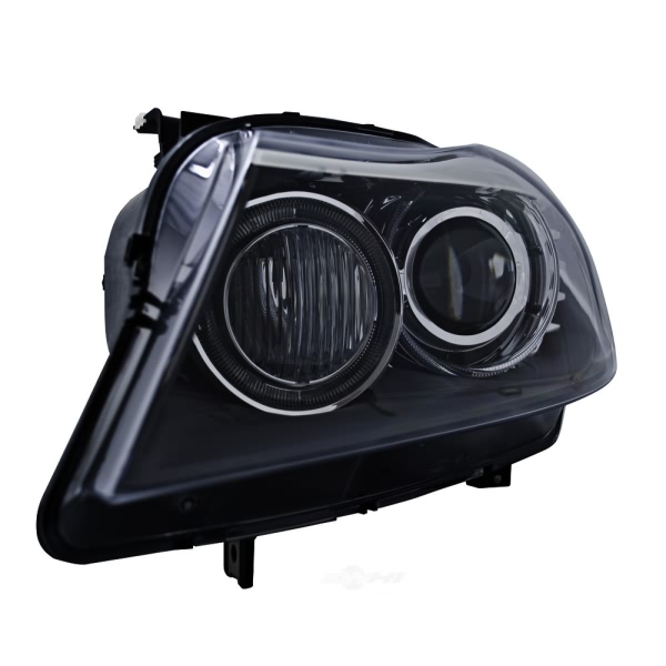 Hella Headlamp Bi-Xen - Driver Side 354692051